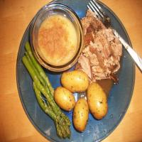 Oven Pork Roast With Applesauce, Baby Potatoes, Gravy and Aspara_image