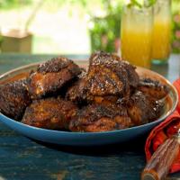 Curry Rubbed Smoked Chicken Thighs with Sorghum-Chile Glaze image