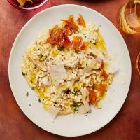 Roast chicken risotto with chicken crackling image
