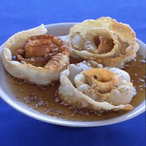 Fried Pastry Spirals with Honey, Sesame, and Walnuts Recipe | Epicurious.com_image
