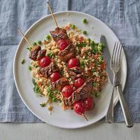 Spiced lamb kebabs with pea & herb couscous_image