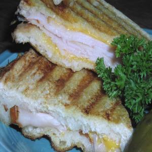 Hot Turkey and Cheddar Cheese Sandwiches image