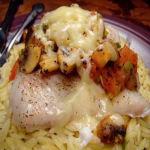 Savory Cheese-Topped Fish Fillets image