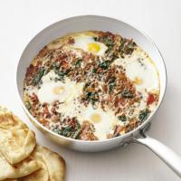 Baked Eggs with Curried Spinach image