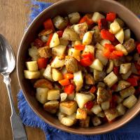 Skillet Potatoes with Red Pepper and Whole Garlic Cloves image