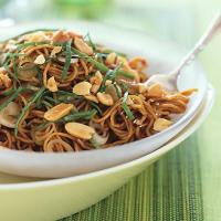 Spicy Sesame Noodles with Chopped Peanuts and Thai Basil image
