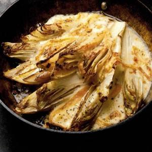 Wilted chicory with melted taleggio cheese_image