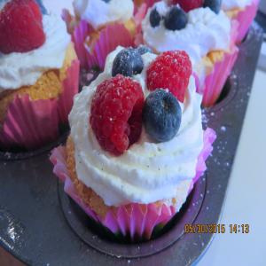 Angel Food Cupcakes W/Whipped Cream N/Berries image