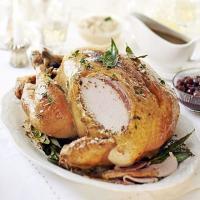 Mustard butter-basted roast turkey with bacon image
