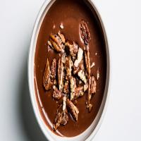 Warm Cocoa Pudding with Candied Pecans Recipe image