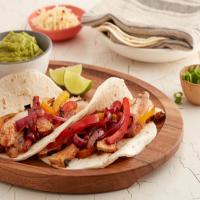 Tex-Mex Pork Fajitas with Peppers and Onions image