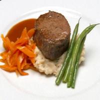 Filet Mignon over Lobster Boursin Mashed Potatoes with a Merlot Reduction image