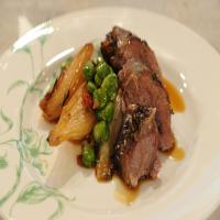 Slow-Roasted Spring Lamb Shoulder with Spring Onion and Fava Bean Salad image