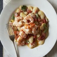 Creamy butter beans with quick fried prawns image