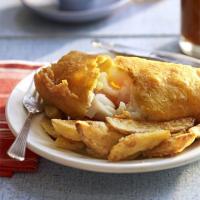 Golden beer-battered fish with chips image