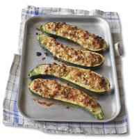 Sausage & herb stuffed courgettes image