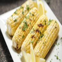 Grilled Sweet Corn With Lemon Pepper Butter Recipe by Tasty_image