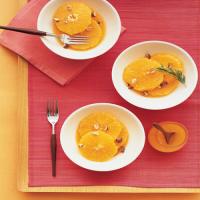 Sliced Oranges with Orange-Flower Syrup and Candied Hazelnuts image
