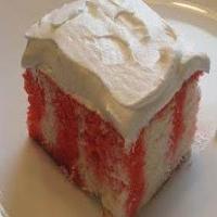 Strawberry jello poke cake with Cool Whip topping image