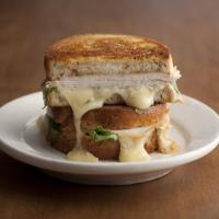 Grilled Turkey, Brie, and Apple Butter Sandwich with Arugula image