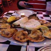 Chargrilled Oysters Acme Oyster House Style image