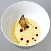 Yukon Gold Potato Soup with Chive Oil, Beet Reduction and Sweet Garlic Confit Croutons image