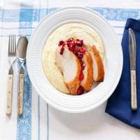 Sliced Chipotle Turkey Breast With Pomegranate Cranberry Relish and Polenta image