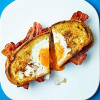 Egg-in-the-hole bacon sandwich image