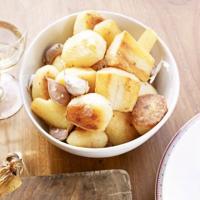 Golden roasted potatoes, parsnips & garlic image