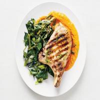 Grilled Pork Chops and Greens with Red Pepper Sauce image