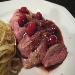 Duck Breasts With Cranberries & Honey Sauce image