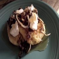 Griddled Polenta Cakes With Caramelized Onions, Goat Cheese, And image