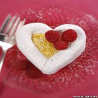 Heart-Shaped Meringues Filled with Passion Fruit Curd image