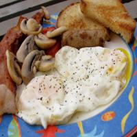 Bacon and Eggs With Tomatoes and Mushrooms image