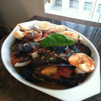 Mussels, Clams and Shrimp in Spicy Broth image