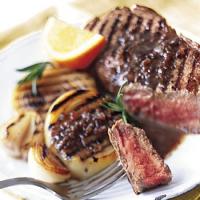 Grilled Steak and Onions with Rosemary-Balsamic Butter Sauce image