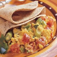 Spicy scrambled eggs with chapatis image