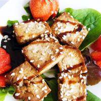 Baked Tofu Bites on a Bed of Leafy Romaine_image