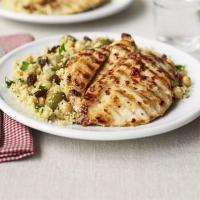 Lemon chicken with fruity olive couscous image