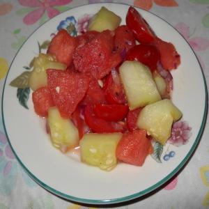 Watermelon, Cherry Tomato, Red Onion and Cucumber Salad image