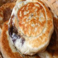 Sweet pancakes with brown sugar syrup filling (Hotteok)_image