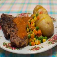 T - Bone Steaks With Garlic Butter Sauce_image