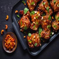 Grilled Soy-Basted Chicken Thighs With Spicy Cashews image