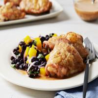 Crispy Roasted Chicken Thighs with Chipotle-Coconut Sauce and Black Bean-Mango Salad image