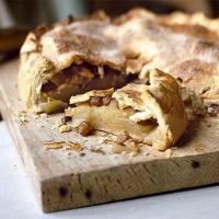 Deep-filled Bramley apple pie image