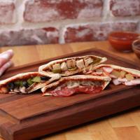 Pita Pizza Pockets 4 Ways Recipe by Tasty image