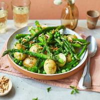 Asparagus with peas, mint & Jersey Royals in wild garlic butter image