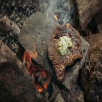 Steak On a Hot Rock with Wild Herb Butter_image