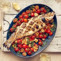 Whole baked fish with watercress & chilli salsa image