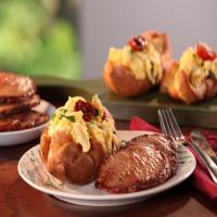 Black Pepper Popovers filled with Vermont Cheddar and Herb Scrambled Eggs and Maple-Mustard Glazed Canadian Bacon_image